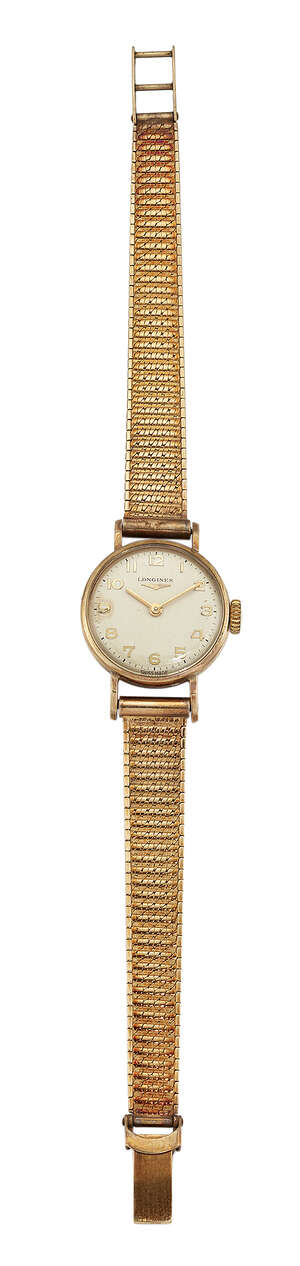A lady's 9ct gold wristwatch, by Longines, the circular silvered dial with applied Arabic numerals, signed Longines, the 17 jewelled lever movement signed 
