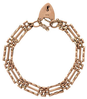 
	
		A 9ct gold bracelet, of gate-link design, to a 9ct gold padlock clasp, approximate length...