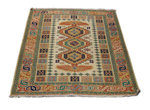 
	
		A Soumak rug, mid to late 20th century, with three medallions in an ivory field, 175cm x...