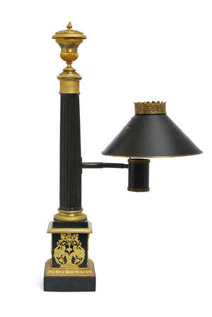 
	
		A Restauration patinated tole and gilt bronze oil lamp, c.1830, the fluted stem with...