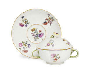 
	
		A Meissen eceulle, cover and stand, mid 18th century, overall moulded with sprays of...
