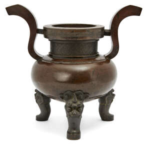 
	
		A Chinese bronze archaistic tripod censer, 17th century, with curved upright handles and...