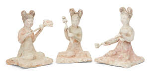 
	
		Three Chinese pottery kneeling female attendants, Tang dynasty, each with painted...
