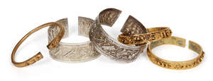 
	
		AMENDMENT: Please note that only two of the bracelets are silver, the other three gilt...