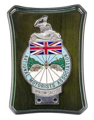 
	
		A National Motorists Association enamelled nickle-plated car bumper badge, 1930s,  with...