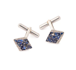 A pair of sapphire and diamond cufflinks, the cufflink panels of lozenge shape, set with...