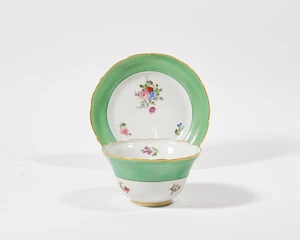 A Chinese porcelain English-decorated tea bowl and saucer, late 18th / early 19th century, the porcelain Jiaqing period, the decoration probably Chamberlain's 