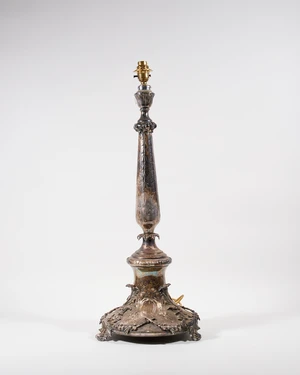 A large silver-plated table lamp, early 20th century, in the form of a candlestick, the foliate...