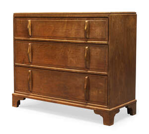 
	
		Cotswold School, an oak chest of drawers    
		c.1930    
		With three long graduated...