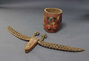 A Tribal sculptural painted and brass mounted cresting, 20th century, in the form of an...
