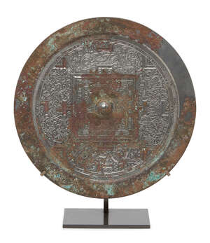 
	
		A large Chinese silvered bronze 'TLV' mirror, Western Han dynasty, finely cast with the...