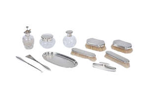 
	
		A silver dressing table set, Birmingham c.1927/1928, Adie Brothers Ltd., comprising five...