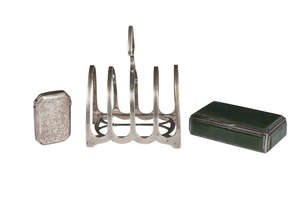 
	
		A silver toast rack, London c.1903, William Hutton & Sons Ltd., a silver vesta and a...