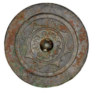 
	
		A Chinese bronze circular mirror, Han dynasty, the central raised knob surrounded by four...