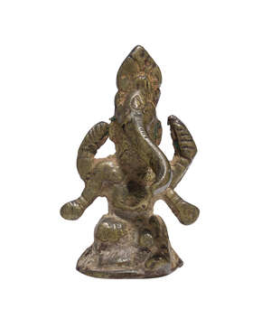 A small bronze figure of Ganesha, 18th century, on a circular base, with flat back, 6cm. high 
		Provenance: Private Collection, UK