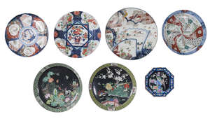 Seven Japanese porcelain charges
Early 20th century
Painted in enamels with birds amongst...