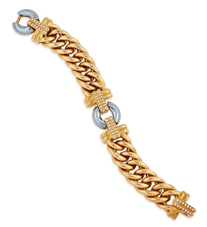 A haematite and diamond bracelet, composed of a disc-shaped hematite panel with brilliant-cut diamond line set shoulders, to curb link chain connections, and a