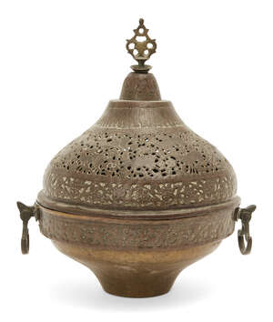 
	
		A domed lidded copper openwork brazier, Iran, 19th century, with openwork finial and...