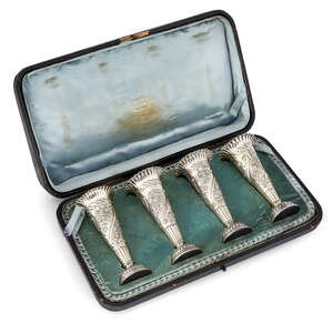 
	
		A cased set of four Victorian silver posy vases, London, c.1895, William Comyns & Sons,...
