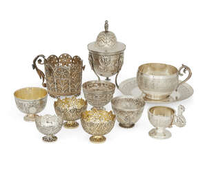 
	
		A nineteenth century Ottoman silver filigree cupholder, with turquoise-set floral points,...