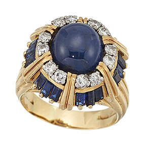 
	
		An 18ct gold, sapphire and diamond ring, by Kutchinsky, the domed cluster set in the...