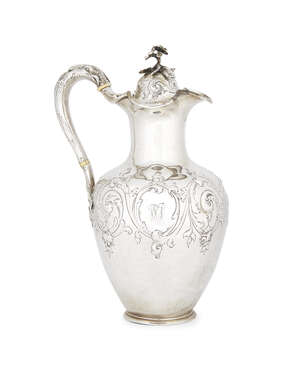 A Victorian silver wine ewer, London, c.1857, Edward & John Barnard, the handle designed as an ibex, with horns tapering to a hinged lid with flower finial, th
