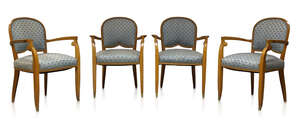 
	
		Jules Leleu (1883-1961), a set of four oak and upholstered elbow chairs
		Designed...