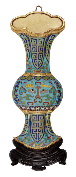 A rare Chinese gilt metal and cloisonné trompe l'oeil gu-form wall vase, Qianlong period, 