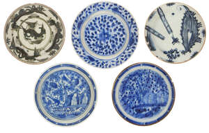 
	
		A group of five intact Safavid blue-and-white dishes, Iran, 17th century, of shallow...