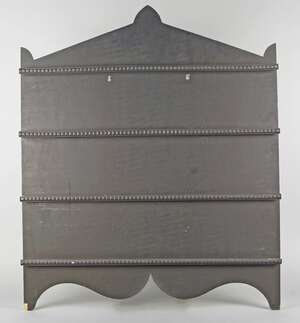 
	
		A collection of twelve Contemporary plywood display racks, each with three railed rows...