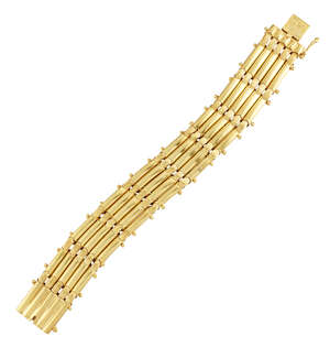 
	
		A bracelet by Lalaounis, composed of five rows of flexible reeded sections with applied...