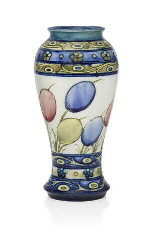 
	
		William Moorcroft (1872-1945), an Honesty pattern ceramic vase 
		c.1930, signed blue...