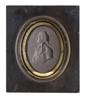 
	
		An English black basalt portrait relief of Admiral Lord Nelson, early 19th century, in a...