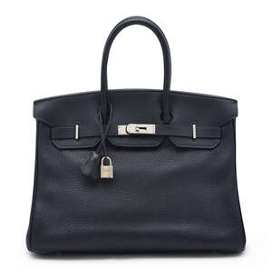 
	
		Hermes: a Birkin Retourne handbag, in navy blue Togo leather, blind stamp D for 2000,...