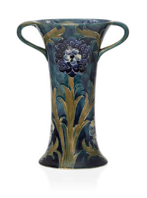 
	
		William Moorcroft (1872-1945), a twin-handled ceramic vase       
		c.1916, signed in...