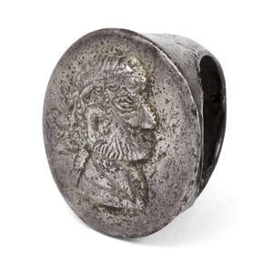 
	
		A Roman silver ring with a repousse portrait of a bearded man, 1st to 2nd century A.D., 
