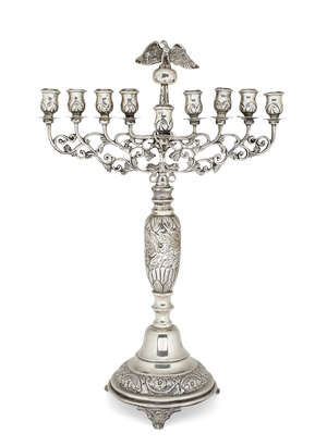 
	
		A large silver menorah by Joseph Zweig, London c.1917, in the Polish manner, the baluster...