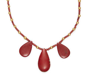 
	
		An Egyptian gold and red glass three tear necklace, New Kingdom, 14th century B.C., on a...