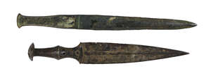 Two Luristan daggers, 9th-7th century B.C., South West Iran, the first with rectangular shaped hilt with missing inlay to either side, the other with domed pom