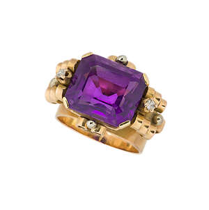 
	
		An amethyst and diamond ring, the central rectangular-cut amethyst with single-cut...