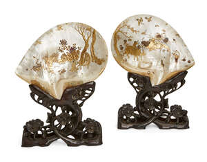 
	
		A pair of Chinese lacquered abalone shells, 19th century, finely gilt lacquered with...