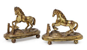 
	
		A pair of mid-19th Century cast brass menu holders, each in the form of a jumping horse,...