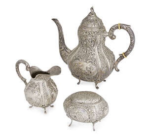 
	
		A Danish silver coffee pot and cream jug, early 20th century, in the rococo style with...