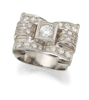 
	
		A diamond cluster ring, of geometric design, the brilliant-cut diamond centre in square...