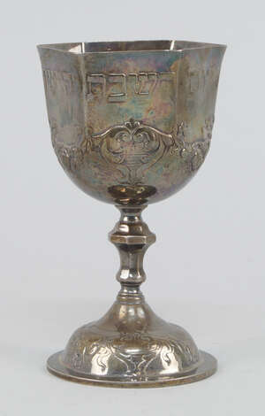 
	
		A Continental silver hexagonal kiddush cup in the 18th century German manner, apparently...