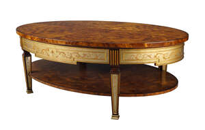 
	
		Theodore Alexander, a flame mahogany oval coffee table, late 21st century, the sunburst...