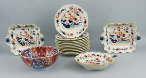 An English ironstone pottery part dinner/dessert service, 19th century, decorated in the Imari pattern with Chinoiserie flowers and stylised fencing, to includ