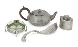 
	
		A Liberty & Co. pewter and green glass circular butter dish
		Stamped English Pewter and...