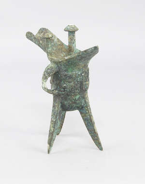 
	
		A Chinese bronze Ju vessel, in the Archaic style, 20cm high

	

