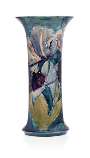 
	
		William Moorcroft (1872-1945), a Purple Iris pattern ceramic vase with flared neck    ...